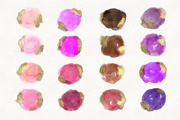 Taches d'aquarelle peintes à la main avec de l'or et des paillettes