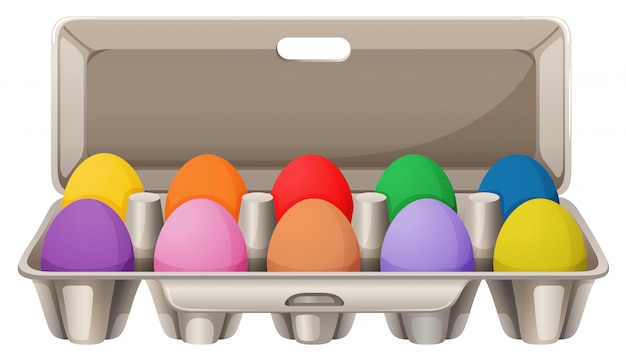 Œufs colorés dans une boîte à œufs