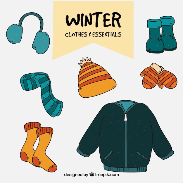 Vecteur gratuit vêtements d'hiver dessinés à la main et essentiels