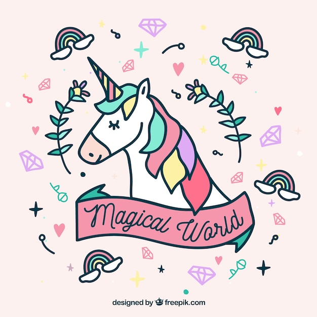 Vecteur gratuit un visage de licorne dessiné à la main et des éléments mignons