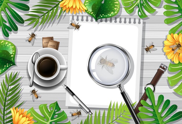 Vue de dessus de la table en bois avec des objets de bureau et des éléments de feuilles et d'insectes