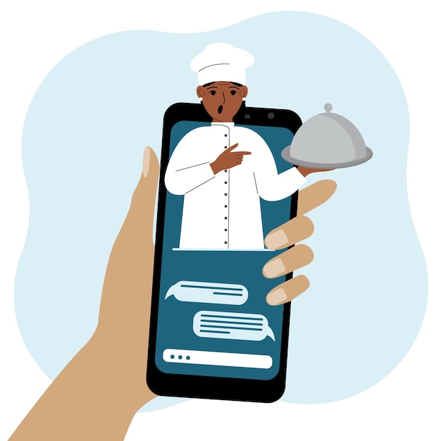Achats alimentaires en ligne sur téléphone portable ou commande de livraison de restauration rapide Le cuisinier tient un plateau avec un couvercle ou une assiette avec une cloche