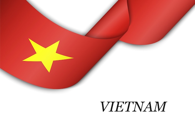 Agitant le ruban avec le drapeau du Vietnam.