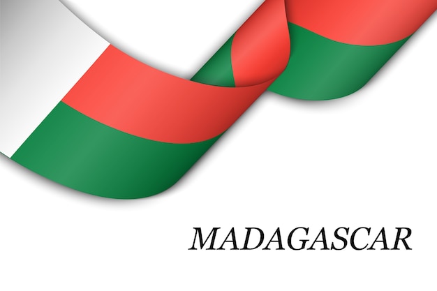Agitant le ruban avec le drapeau de Madagascar.