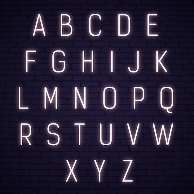 Alphabet néon sur fond de briques