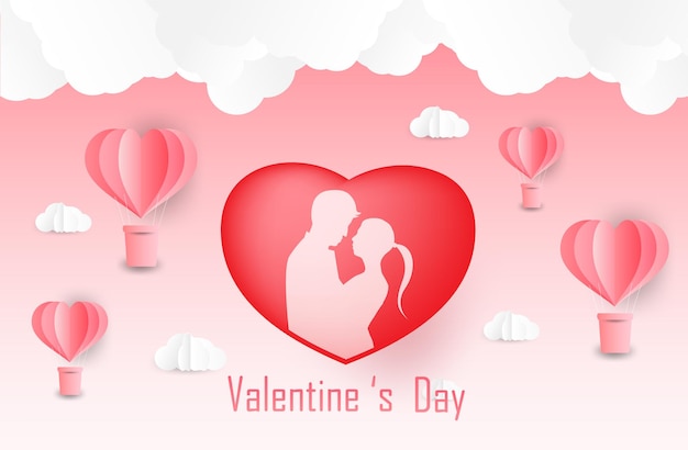 Les Amoureux De L'amour Et De La Saint-valentin Se Tiennent Debout Et Un Ballon En Forme De Coeur D'art En Papier Flottant Dans L'artisanat Du Ciel