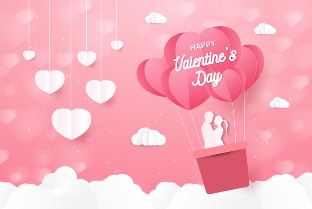 Les amoureux de l'amour et de la Saint-Valentin se tiennent debout et un ballon en forme de coeur en papier flottant dans le ciel