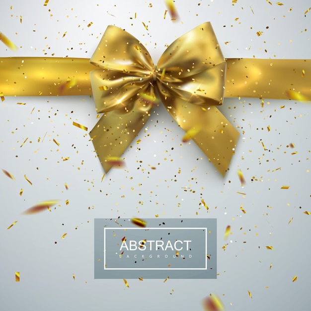 Arc et ruban d'or avec des paillettes de confettis étincelants