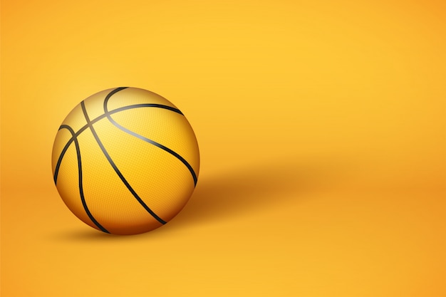 Ballon de basket sur fond jaune vif