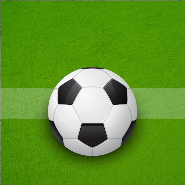 Ballon de football sur le terrain. Contexte.