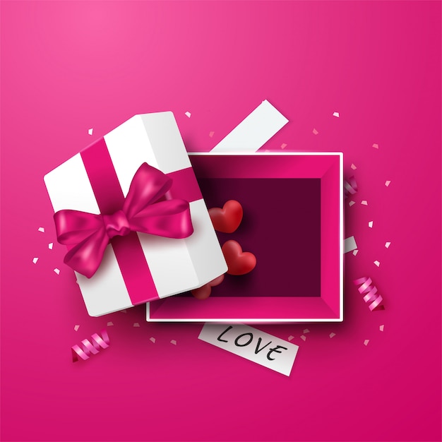 Boîte cadeau blanche surprise avec ruban rouge et ballon coeurs, boîte cadeau ouverte isolée, conception de la Saint-Valentin.