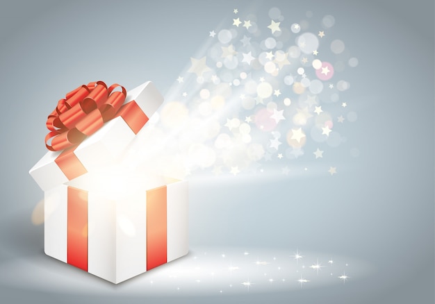 Boîte cadeau ouverte avec un arc rouge et des lumières scintillantes