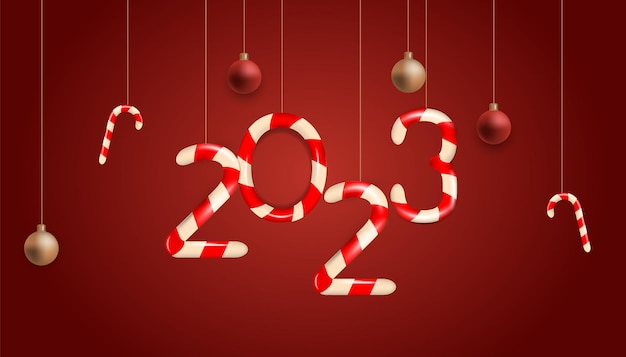 Bonne année 2023 bannière. Texte de canne en bonbon 3d 2023 suspendu avec des boules de Noël sur fond rouge