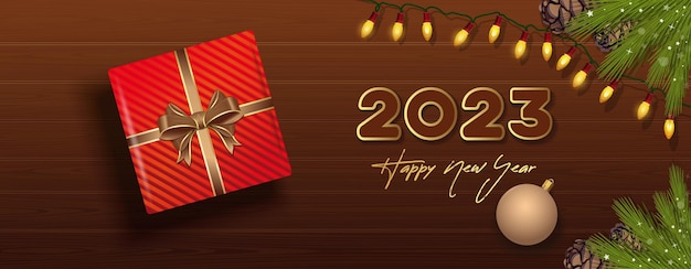 Bonne année 2023. Large bannière de Noël horizontale avec boîte-cadeau, vue de dessus