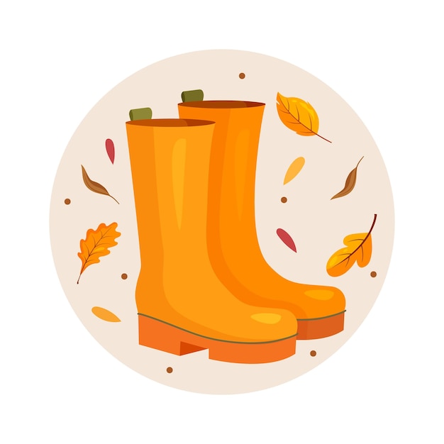 Bottes en caoutchouc d'automne sur le fond avec des feuilles jaunes