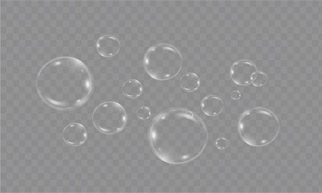 Des bulles de savon vectorielles réalistes isolées sur un fond transparent L'effet de la chute