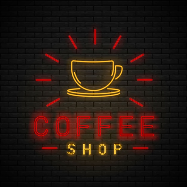 Café Neon Light. Enseigne au néon de café sur le mur de briques.