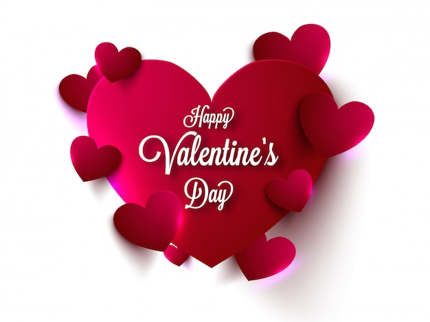 Calligraphie de joyeuse saint valentin sur coeur, décorée