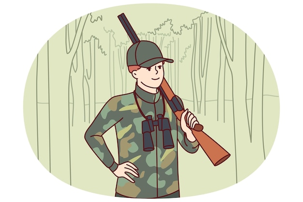 Un chasseur d'hommes avec un fusil à double canon se dresse dans la forêt avec des jumelles pour traquer un animal sauvage