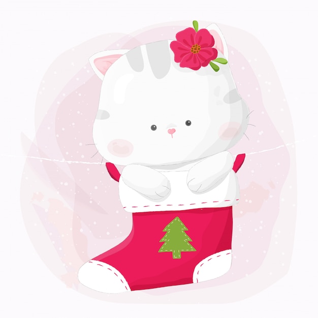 Chat kitty dessiné main mignon suspendu en bas de Noël.