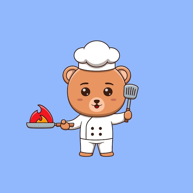 Chef mignon d'ours tenant la spatule et la poêle à frire brûlante