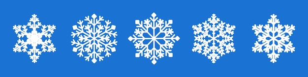 Collection de flocons de neige blancs isolés sur fond bleu Icônes de neige plates Silhouette de flocons de neige Nouveau