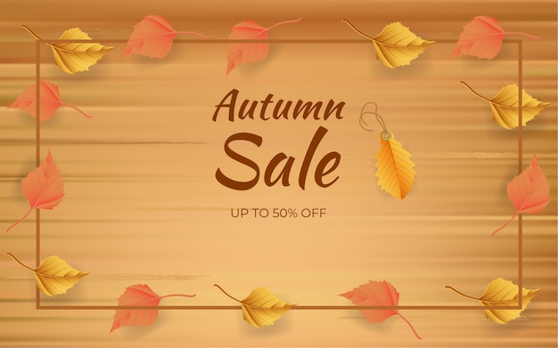 Concept de design de vente automne avec des feuilles sur planche de bois