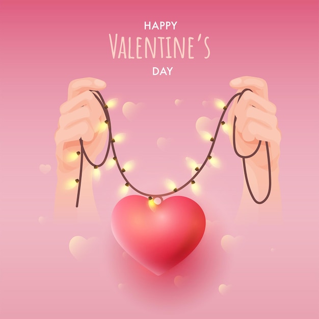 Concept De La Saint-valentin Heureuse Avec La Main Tenant La Guirlande D'éclairage Et Le Pendentif Coeur Sur Fond Rose Brillant.