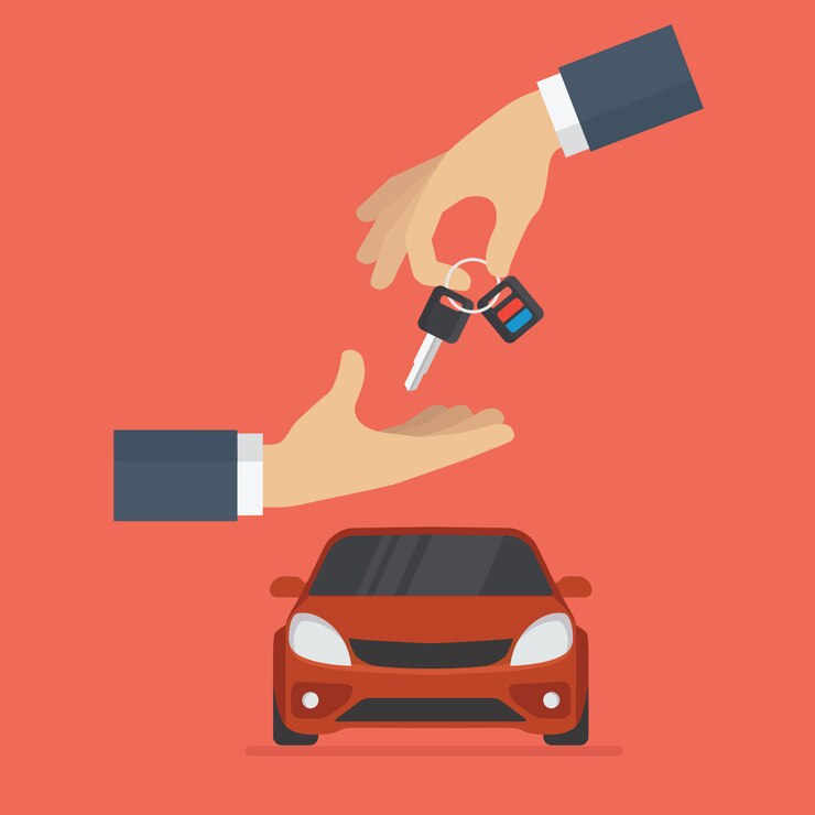 Le concessionnaire automobile donne la clé de la voiture à l'acheteur