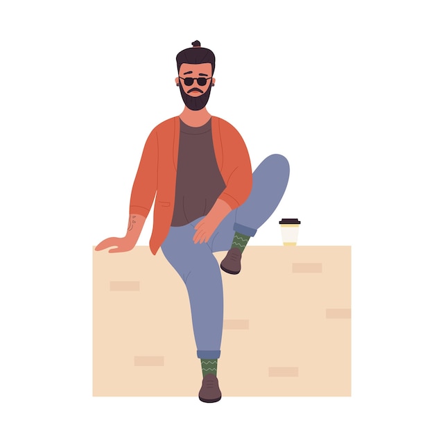 Cool hipster homme en pose assise