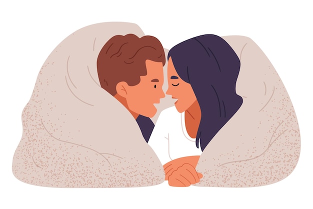 Un couple amoureux sous les couvertures La famille passe du temps ensemble