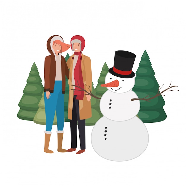 Couple Avec Bonhomme De Neige Et Pins