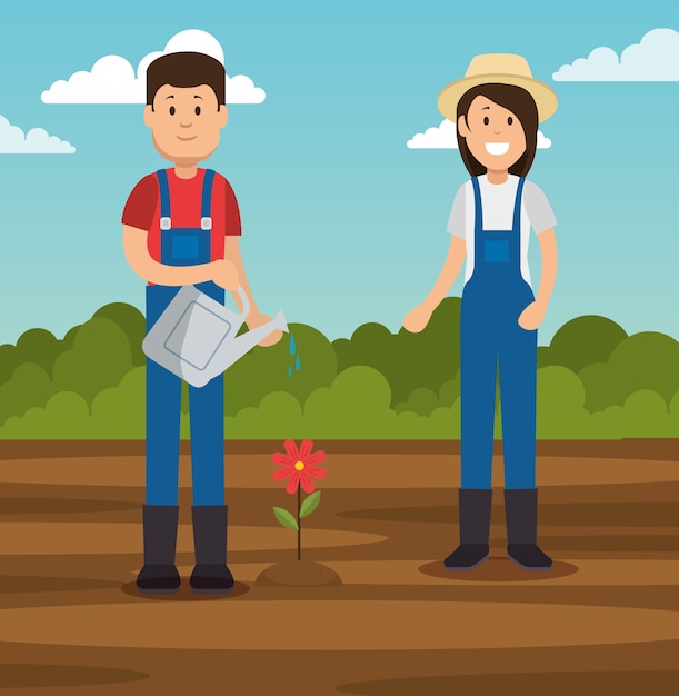 Couple De Jeunes Jardiniers Faisant Des Travaux De Jardinage