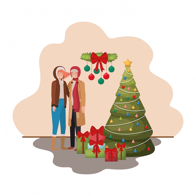 Couple Avec Sapin De Noël Et Cadeaux