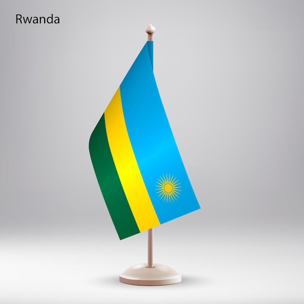 Le drapeau du Rwanda suspendu à un porte-drapeau