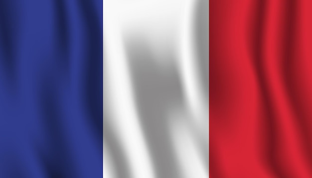 Un drapeau de la France flotte au vent