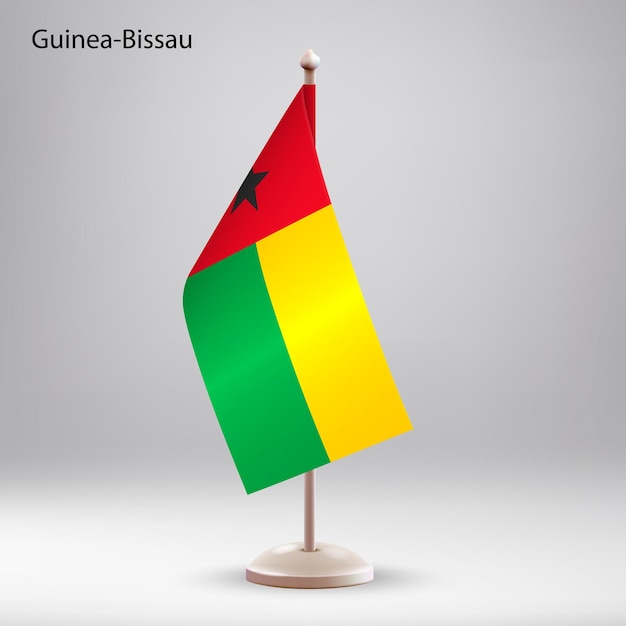 Le Drapeau De La Guinée-bissau Suspendu à Un Porte-drapeau