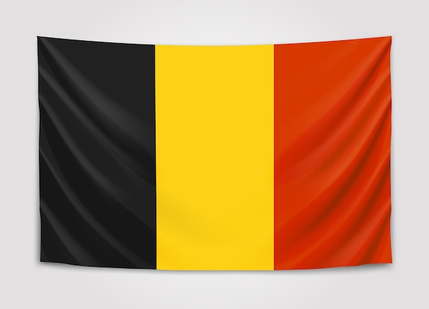 Vecteur drapeau suspendu de la belgique. royaume de belgique. drapeau national