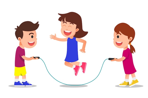 Enfants heureux jouant à la corde à sauter ensemble