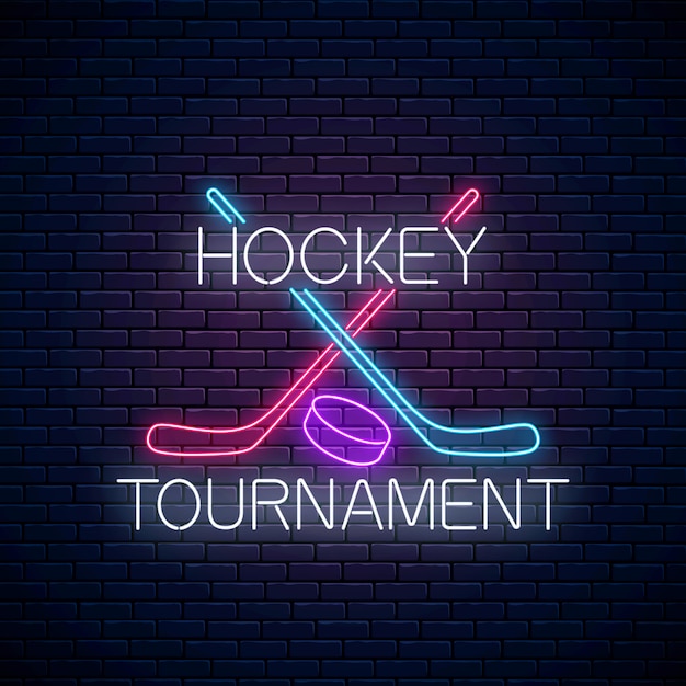 Enseigne au néon de tournoi de hockey avec des bâtons de hockey et une rondelle.