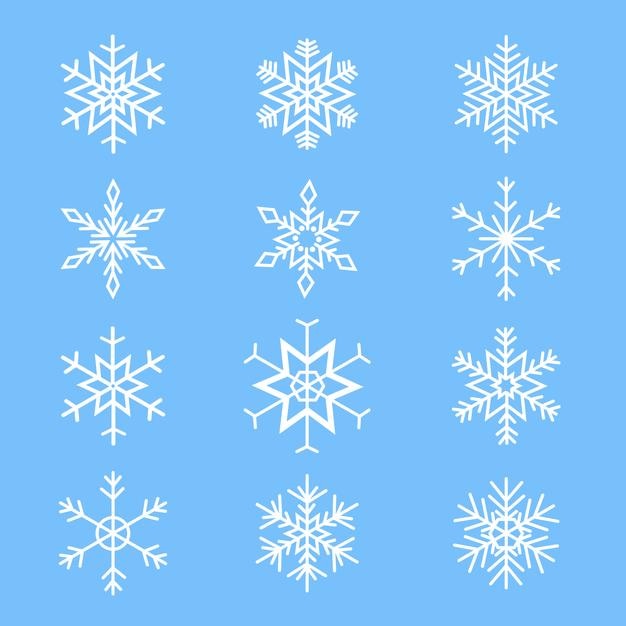 Ensemble de flocons de neige neige chute de neige de Noël une collection de flouilles de neige sur un fond bleu