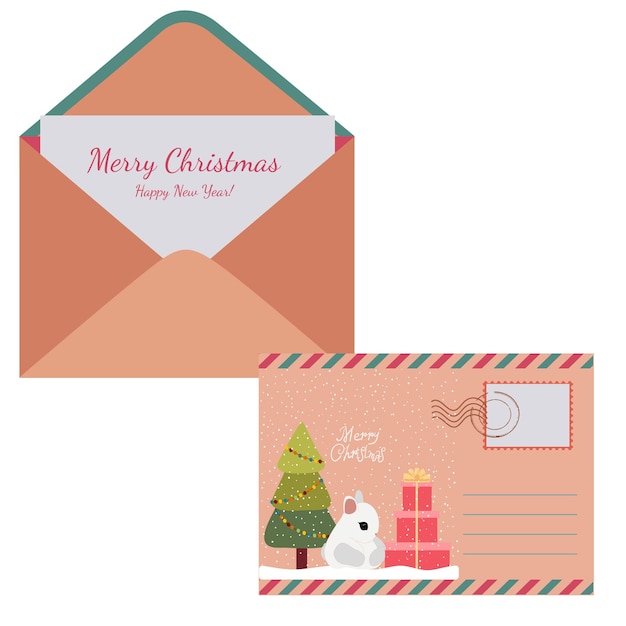 Une enveloppe avec une carte postale et l'inscription Joyeux Noël et Nouvel An
