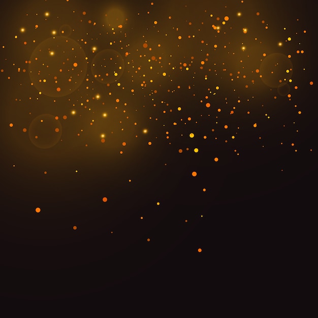 Les étincelles de poussière et les étoiles dorées brillent d'une lumière spéciale. Des particules de poussière magiques étincelantes.