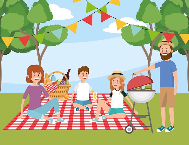 Famille à la nappe et pique-nique ludique avec panier