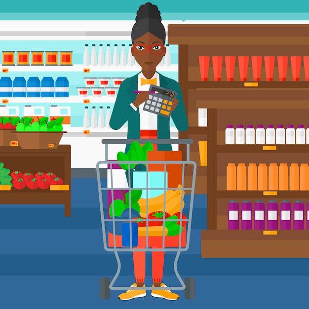 Femme, compter, calculatrice, supermarché
