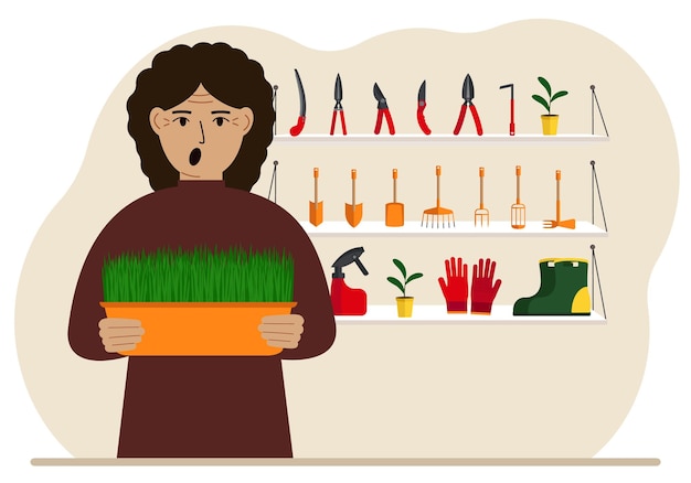 Une femme tient une plante dans ses mains sur fond d'outils de jardinage Concept de jardinage