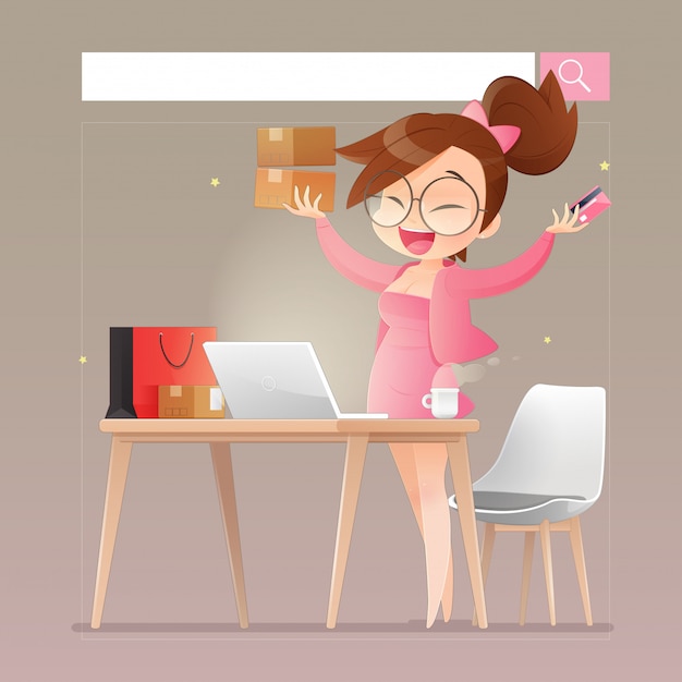 Les femmes achetant du rose achètent en ligne avec un ordinateur portable