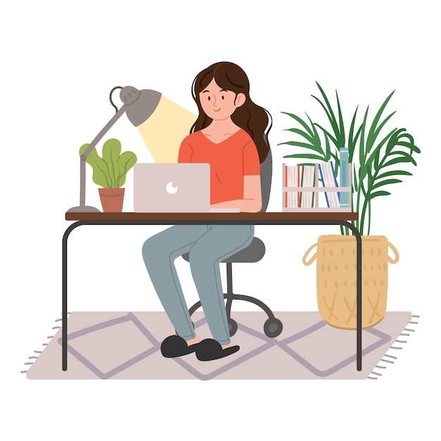 Les femmes qui travaillent à domicile Des ordinateurs portables, des pots de fleurs et des livres sont placés sur le bureau