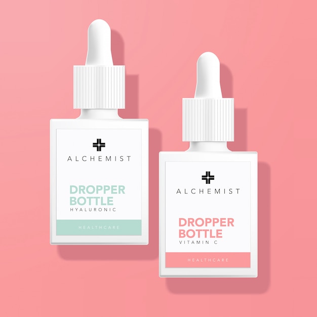 Flacon compte-gouttes pour la thérapie médicale des soins de santé en fond rose