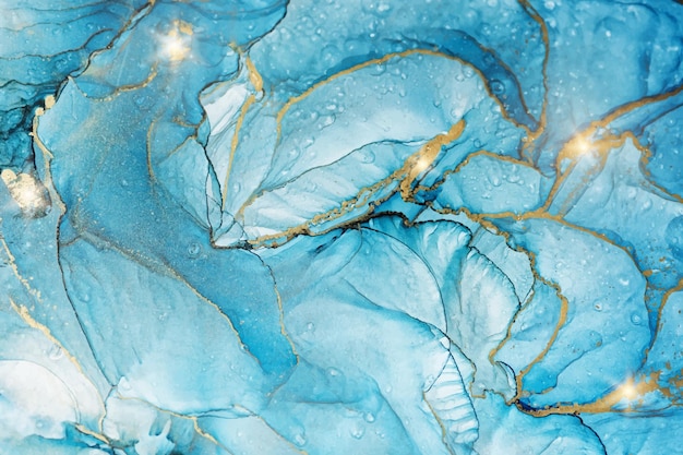 Vecteur fond aquarelle liquide bleu cyan avec des taches dorées